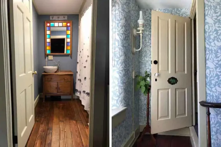 mall bathroom with colorful mirror and hallway with patterned wallpaper.