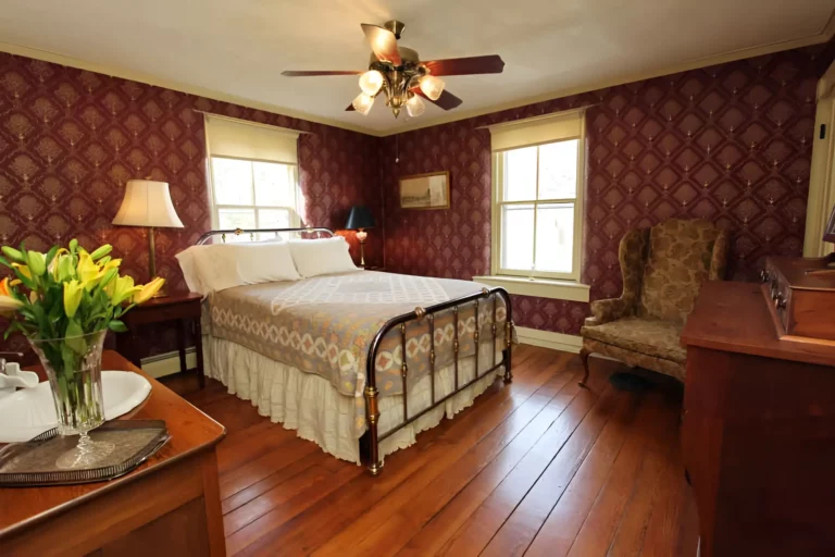 Patterned wallpaper in vintage bedroom